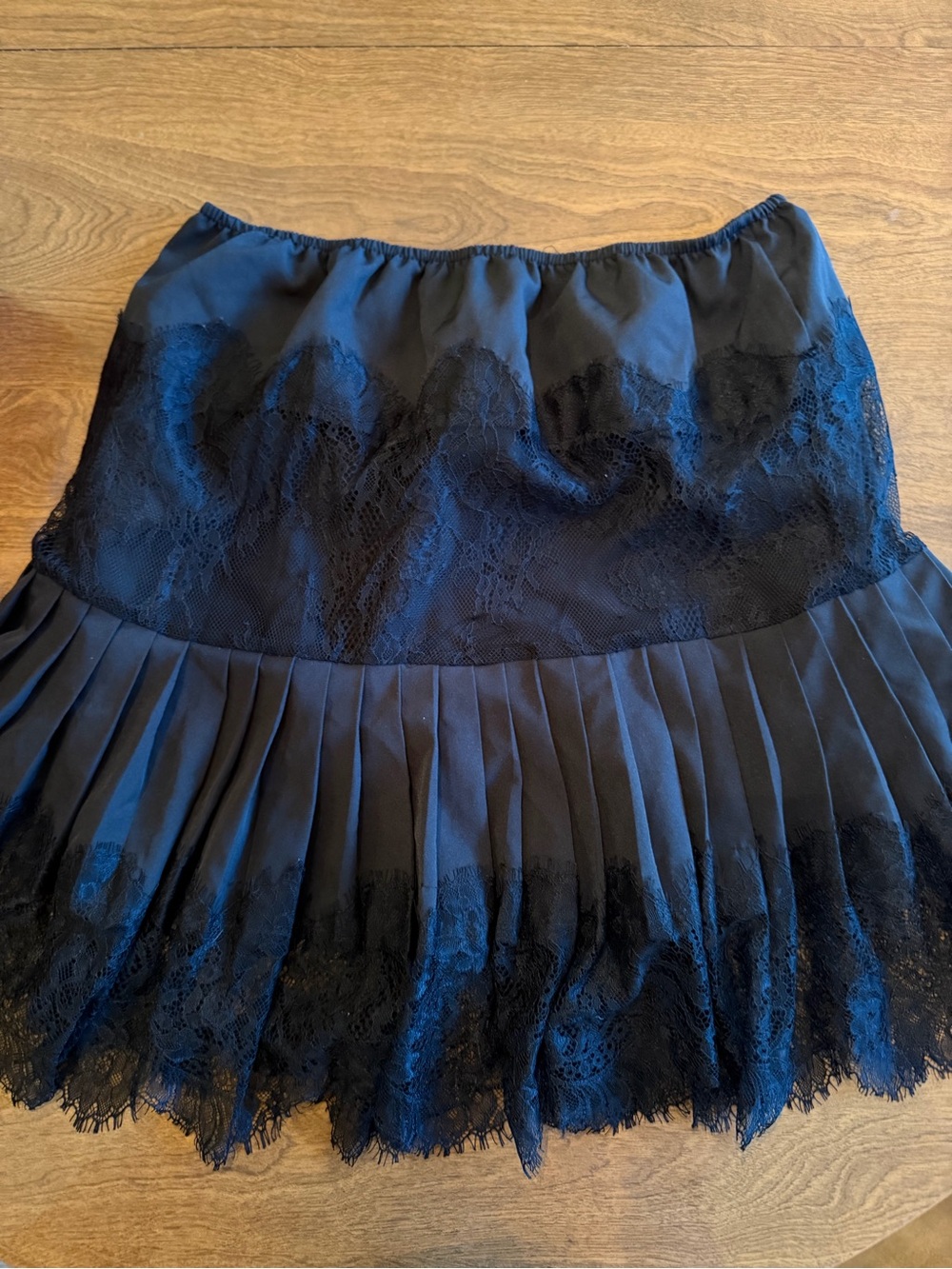 Black lace pleated mini skirt